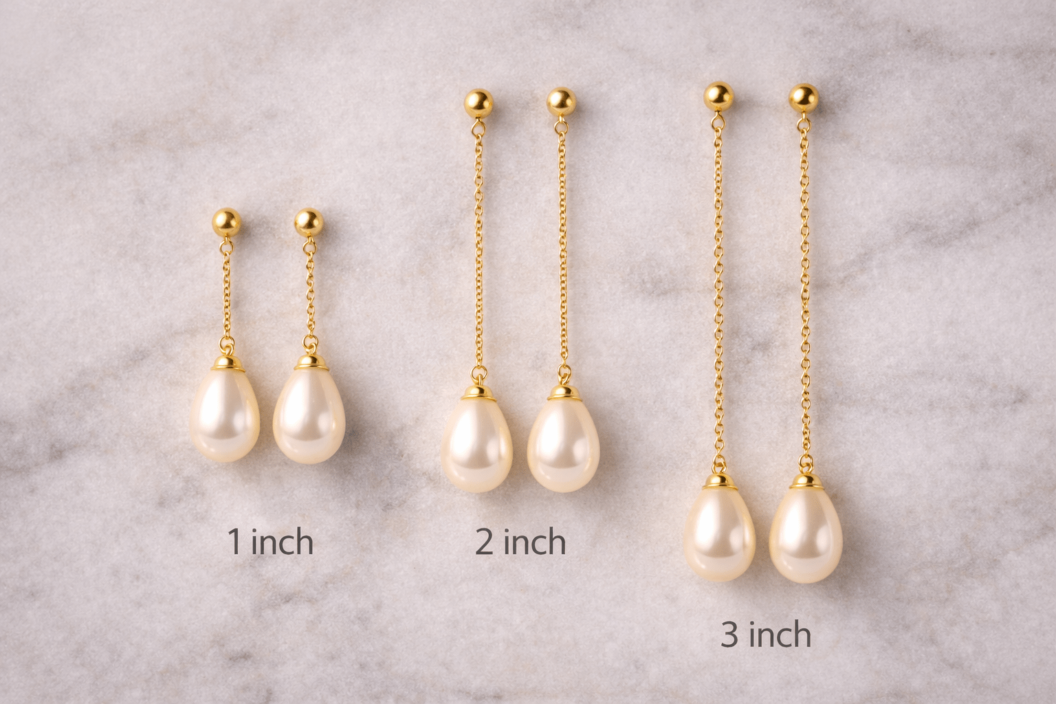 Différentes longueurs de boucles d'oreilles pendantes